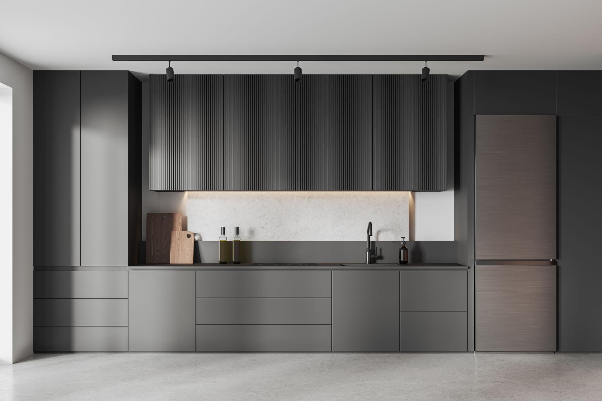 Stylish home kitchen interior with cooking zone with refrigerator